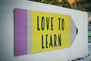 Love to learn and progress sign